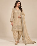 Beige embellished kurta with Patiala-style trousers and matching dupatta.