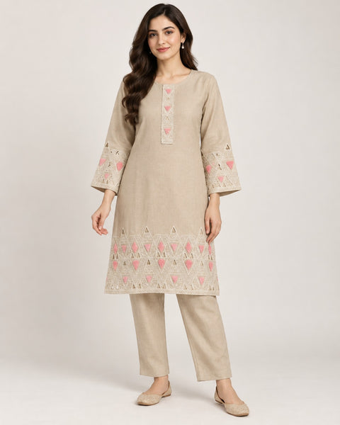 Beige and pink geometric khadi co-ord set with matching trousers.