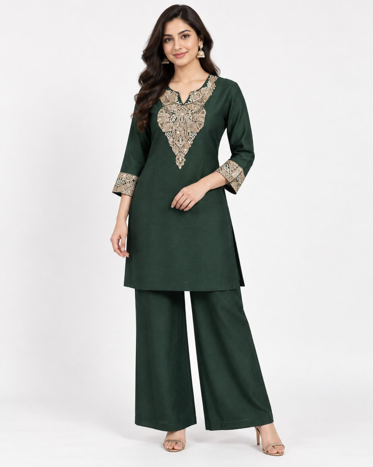 Deep green kurta and wide-leg trouser set with ornate gold-toned embroidery.