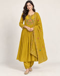 Mustard floral embroidered flared kurta with dhoti-style trousers and matching dupatta.