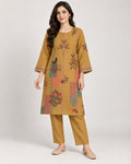 Mustard printed straight kurta and trouser co-ord set with multicolour motifs.