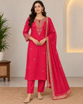 Rani pink embroidered kurta, straight trousers and matching dupatta set.
