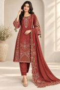 Rust floral embroidered kurta and trouser set with cutwork sleeves and matching dupatta.